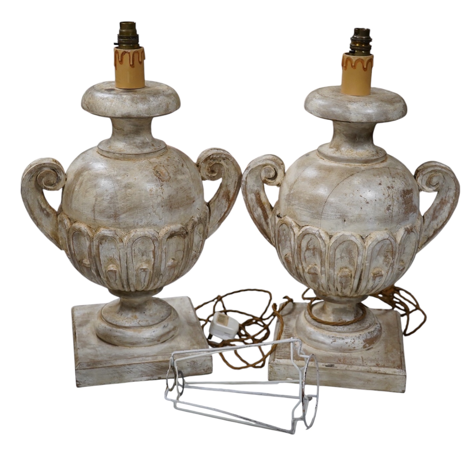A pair of carved and painted wood table lamps, 44cm excluding fittings. Condition - fair to good, not tested